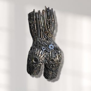 Graceful Metal Wall Art: Captivating Sculpture of a Woman's Torso in Metallic Tones