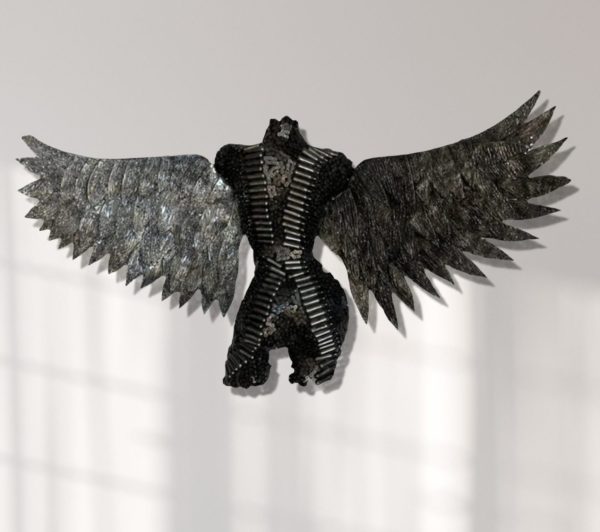 torso with Wings: Handcrafted Metal Female Torso with Captivating Chain Wings