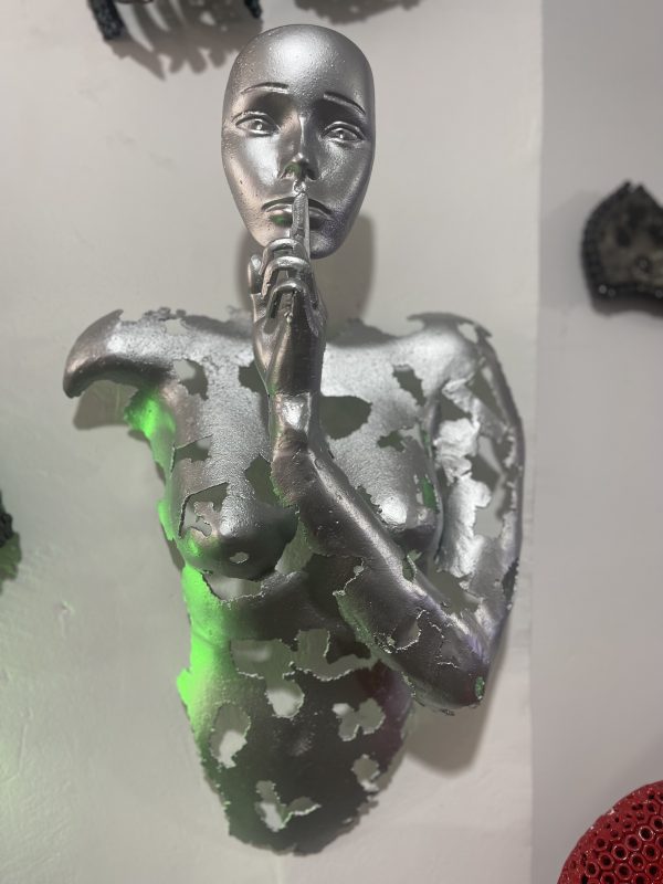 Silver Face with Finger to Lips Statue