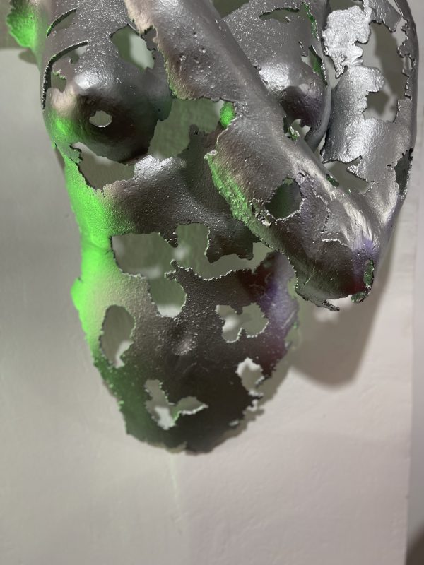 Silver Face with Finger to Lips Statue