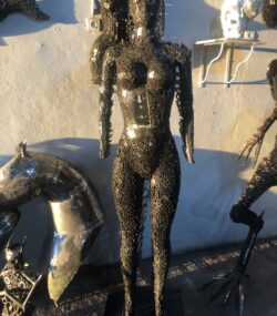 Handcrafted black standing woman metal bust female