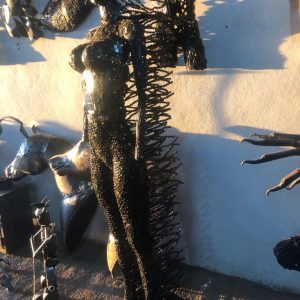 Handcrafted black standing woman metal bust female