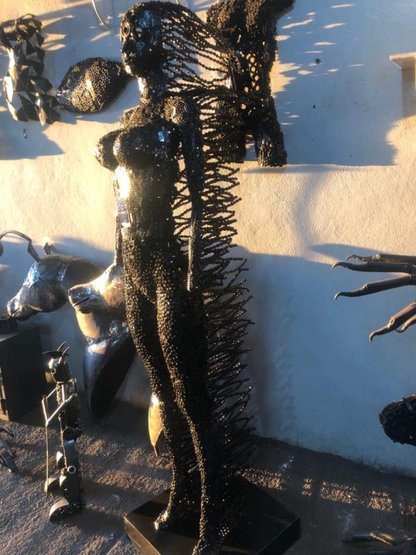 Handcrafted black standing woman metal bust female