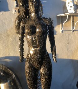 Handcrafted black standing woman metal bust female