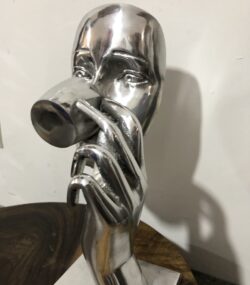 Silver drinking Face | calm Reflection statue
