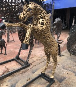 Golden small standing metal scrap horse