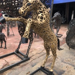 Golden small standing metal scrap horse